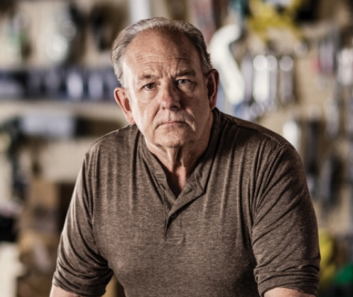 Portrait of an older man looking serious